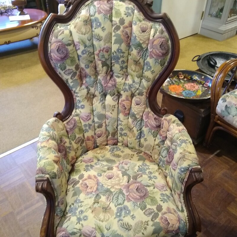 Victorian Floral Chair

Pink, blue, green on ivory upholstered chair with ornate wood detail.