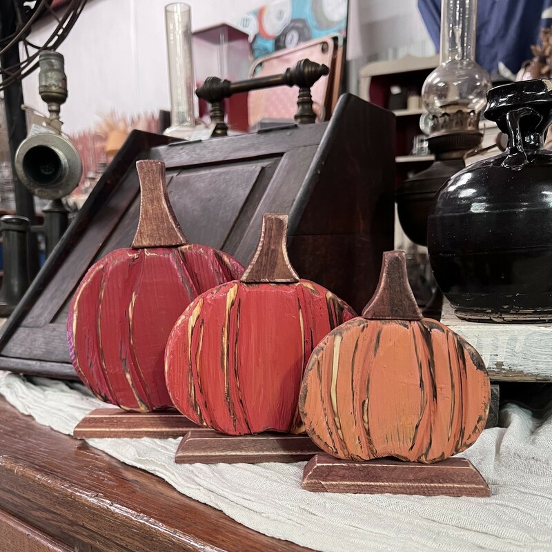 This adorable set of three pumpkins are made of wood and will add nice touch anywhere in your home this fall.
Small measures 5 and half inches tall and 4 inches wide.
Medium measures 6 and a half by 6 inches tall
Large measures 8 inches tall and 6 and half inches wide