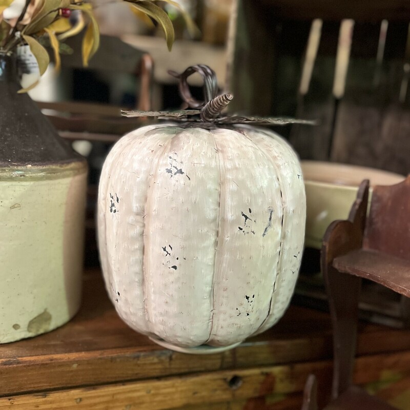 This beautiful distressed white pumpkin that stands 12 inches tall and is 9 inches wide would be a perfect addition to your fall decor and because its metal it can be used outdoors as well!