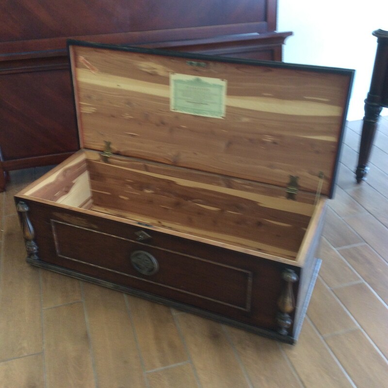 This is a beautiful Roos Antique Cedar Chest. This chest has a nice dark stain and lock and key for safe storage.