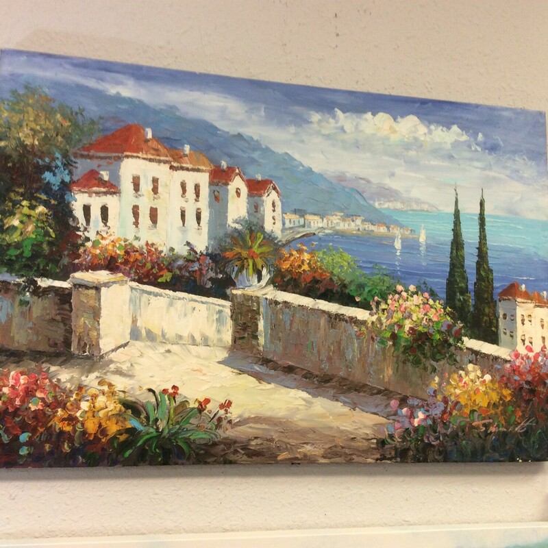This is a beautiful Oil on Canvas Mediterranean Seaside Scene Painting. This painting has beautiful use of colors and is signed by the artist.