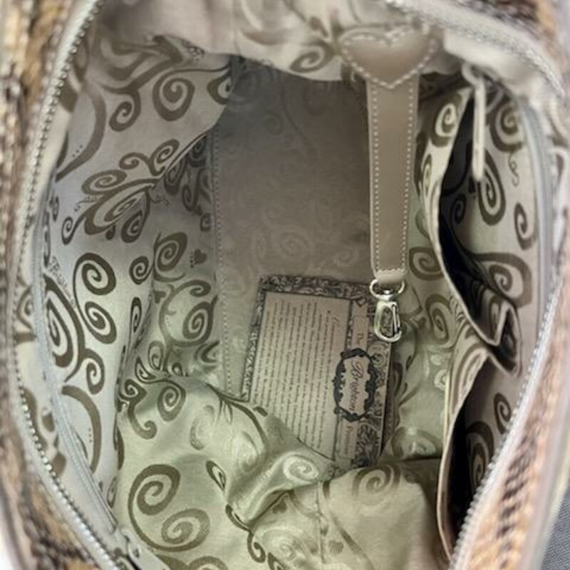 BRIGHTON<br />
Leather  Brighton snake print soft bucket shoulder bag.<br />
2 zipper pockets and 2 small pockets.<br />
Comes with Original Dust Cover.<br />
Original Retail Price:  $350.00<br />
This bag is in like new condition.