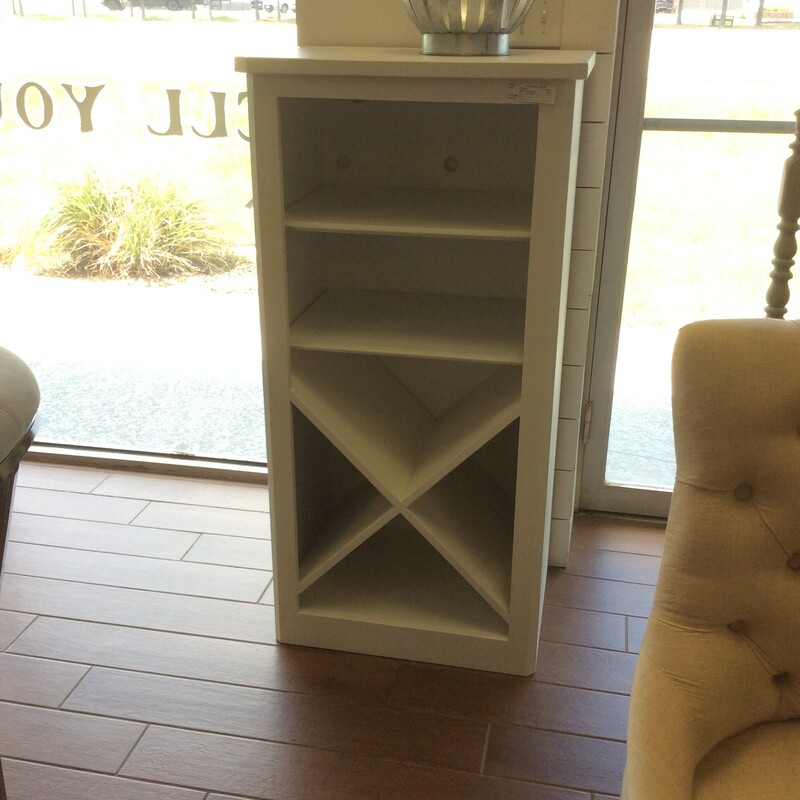 This is a white Wine Bar Cabinet. This cabinet has 2 adjustable shelfs and X shelf for bottles of wine.
