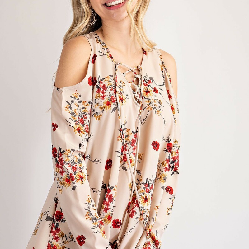 Floral Print
Woven Top
Features a Cold Shoulder
And V-Neckline with Lace-Up
Made in the U.S.A