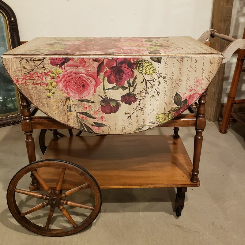 Vintage Tea Cart, Floral design on top. Size: 28in tall, 31 in long. 37.5in  wide open and 16in wide closed.