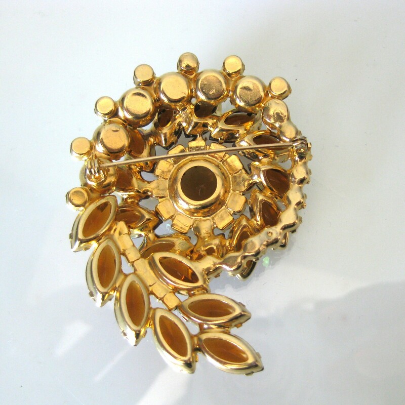 Spiral Jeweled Brooch, Amber, Size: Large<br />
<br />
Gorgeous statement brooch of maquise jewels deep in amber/topaz interspersed with aurora borealis solitaires.<br />
the brooch measures 3.5 across.<br />
<br />
excellent condition!<br />
thanks for looking!<br />
#51055