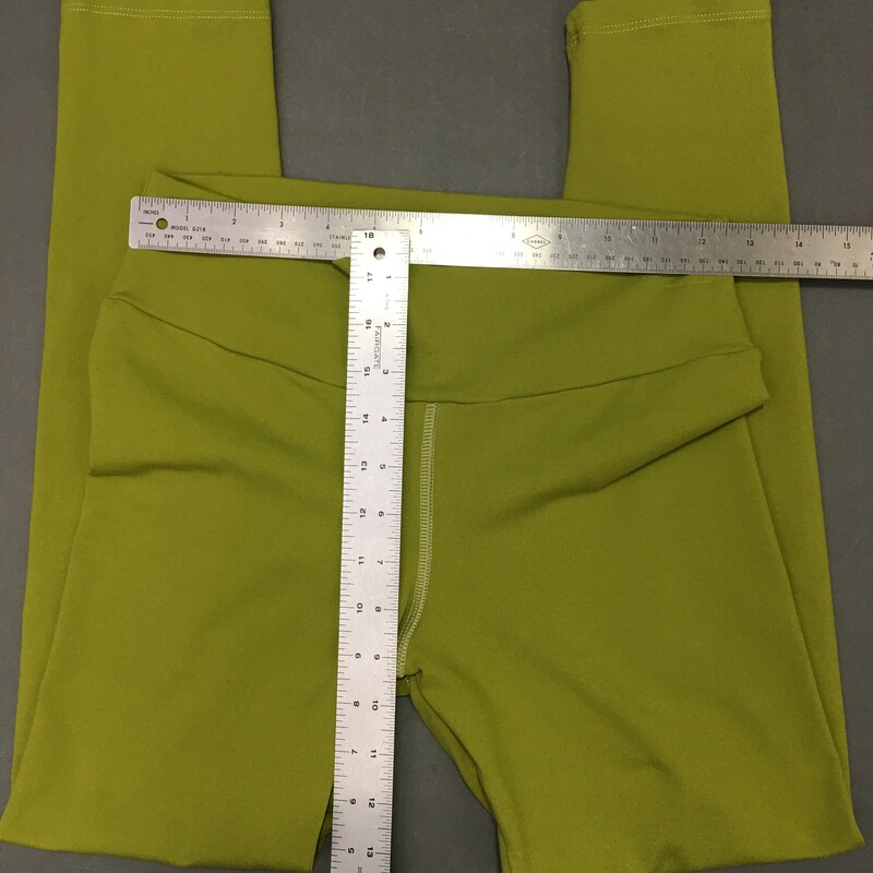 Olive Leggings No Brand Tags Size: solid Heavy stretch fabric with wide waist band.  Size runs small<br />
8.5 oz
