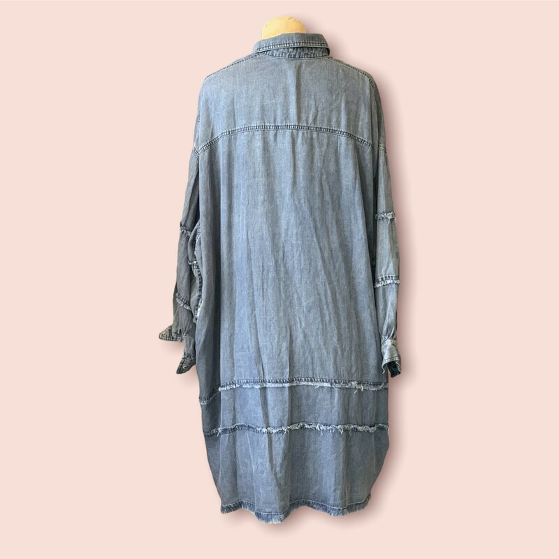 This beautiful denim dress is made of a soft fabric and has frayed hems all over. This dress has such a fun and unique look!