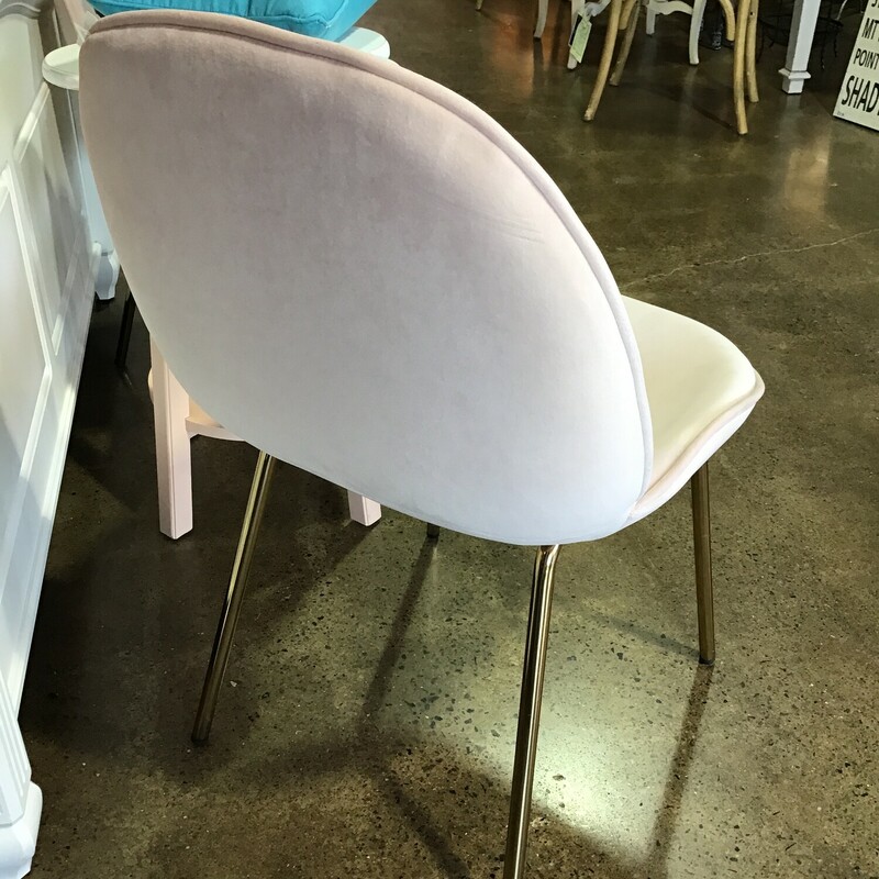 A versatile, clean silhouette is dressed up in blush pink and gold to give your home a glamorous update. This brand new gorgeous chair invites you to lingering a little longer in its ergonomic seat and soft fabric upholstery. Stainless Steel gold legs are complete with protective plastic feet to keep your floors scratch-free. The perfect standout piece for a modern apartment or loft space.
Dimensions:  21 x 18 x 33
Matches #148127