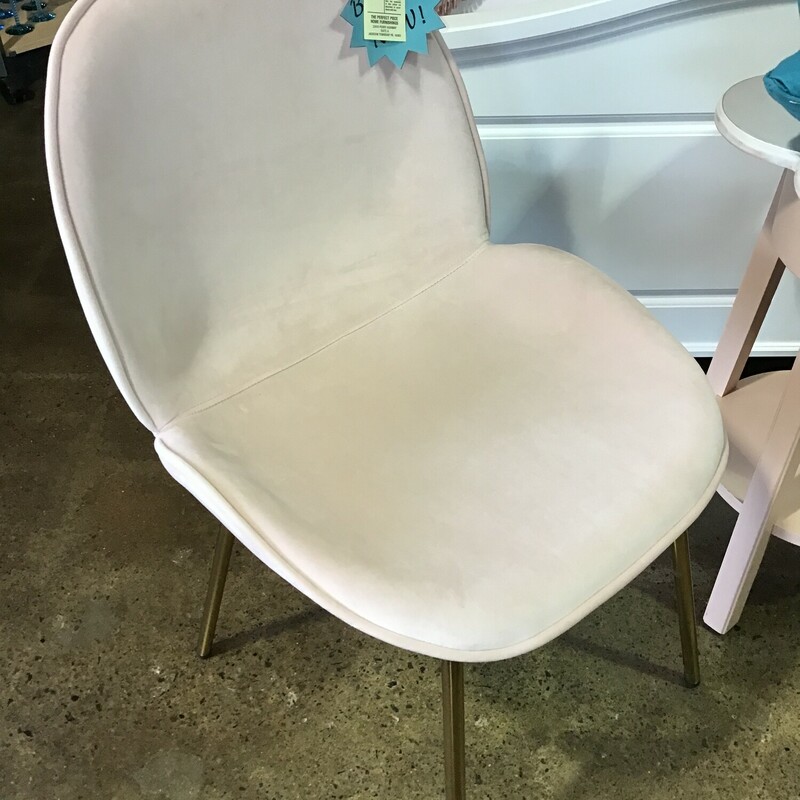 A versatile, clean silhouette is dressed up in blush pink and gold to give your home a glamorous update. This brand new gorgeous chair invites you to lingering a little longer in its ergonomic seat and soft fabric upholstery. Stainless Steel gold legs are complete with protective plastic feet to keep your floors scratch-free. The perfect standout piece for a modern apartment or loft space.
Dimensions:  21 x 18 x 33
Matches #148127
