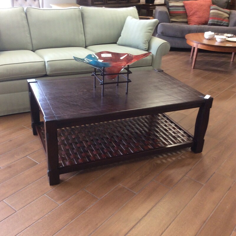 This is a dark brown, South Cone Leather Top Coffee Table.