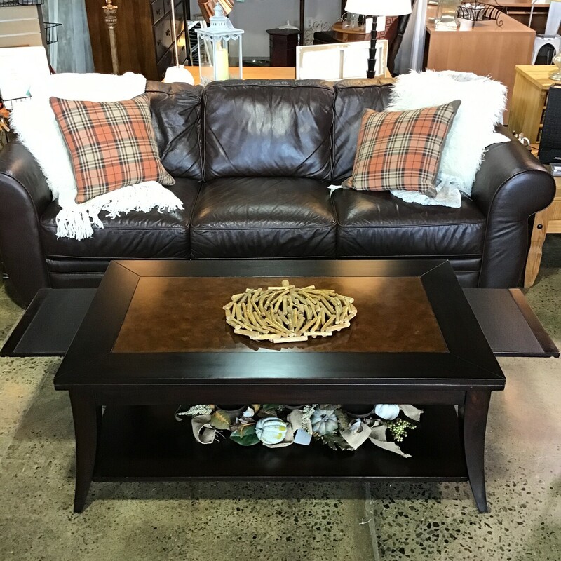 Rectangle Coffee Table<br />
Dark Brown<br />
Pull out side trays<br />
Coppery top<br />
Lower shelf<br />
Dimensions: 48x28x19