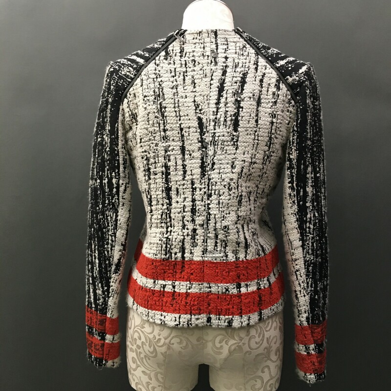 Parker Boucle Moto Style, Blk/wht, Size: Large<br />
Black and white Boucle, Orange stripe printed on fabric  along the bottom and on wrists of sleeves..Very trendy and hip jacket. Zip up, no pockets, fully lined.<br />
1 lb 6 oz