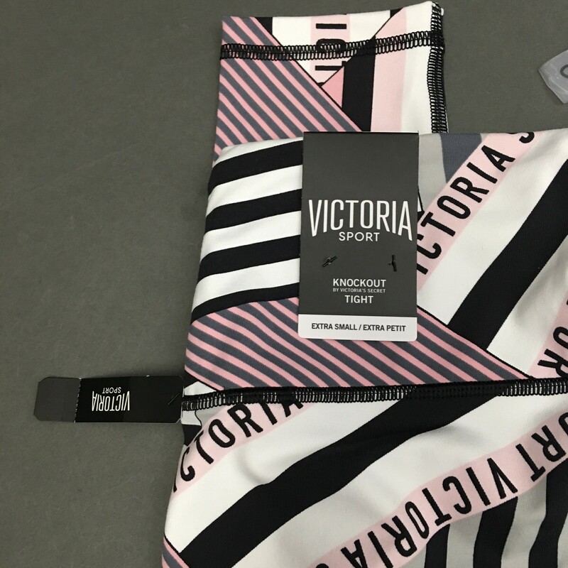 Victoria Sport Knockout Leggings, Multi color pink, grey, black and white geometric pattern, Size: XS
new with tags. Waistband smooths and stays put, smooth seams for total comfort,lined reinforced gusset, hidden drawstring waist, body wicking fabric.
7.3 oz