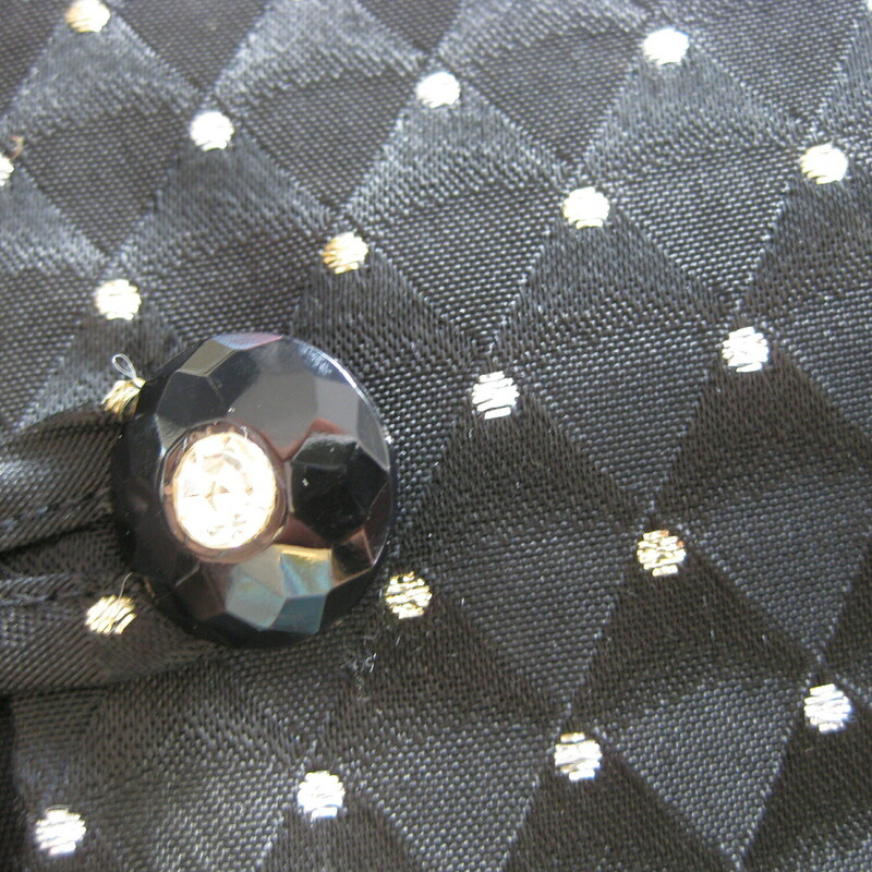 Vtg Personal Evening, Black, Size: 10<br />
<br />
Handy jacket to have to dress up outfits.<br />
Collarless black blazer with diamond pattern quilt like stitching and little gold and silver stitched dots all over<br />
Pretty jeweled button and loop closure<br />
Lined with built in shoulder pads<br />
Marked size 10, here are flat measurements:<br />
armpit to armpit: 20.5<br />
Length: 23.25<br />
underarm sleeve seam: 15.75<br />
made in the USA<br />
<br />
<br />
Thanks for looking!<br />
#43213