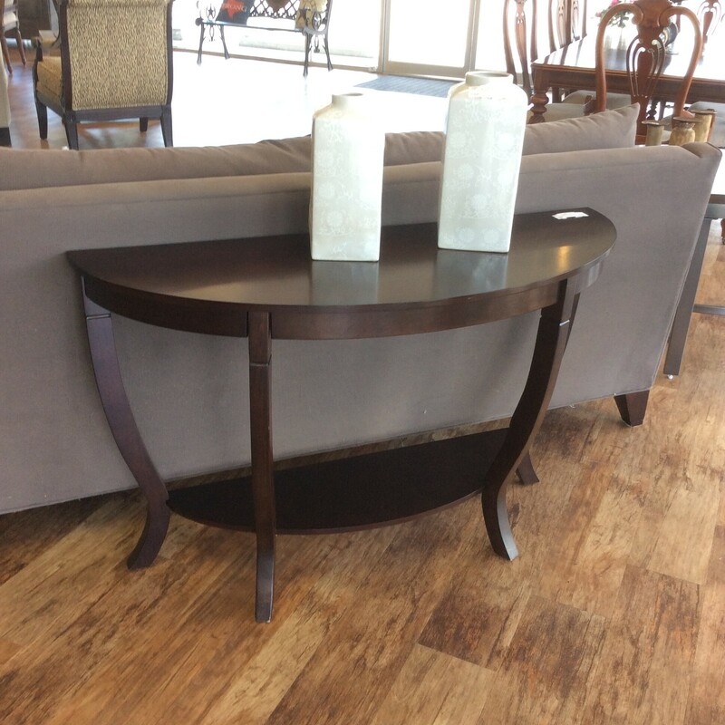 This is a dark brown, sleek, Half Moon Entry/Sofa Table.