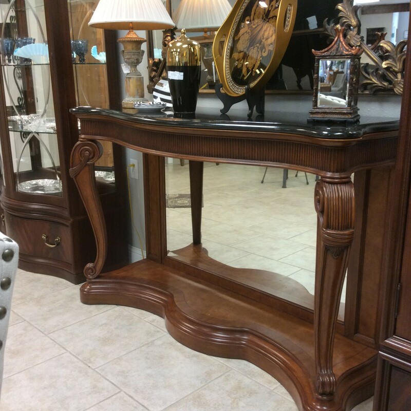 This is a beautiful black marble top with mirrored back Entry Table.