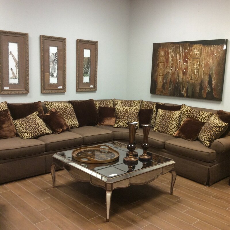 This is a beautiful, brown Paul Roberts Sectional with 19 Cheetah and Brown Velvet Pillows.