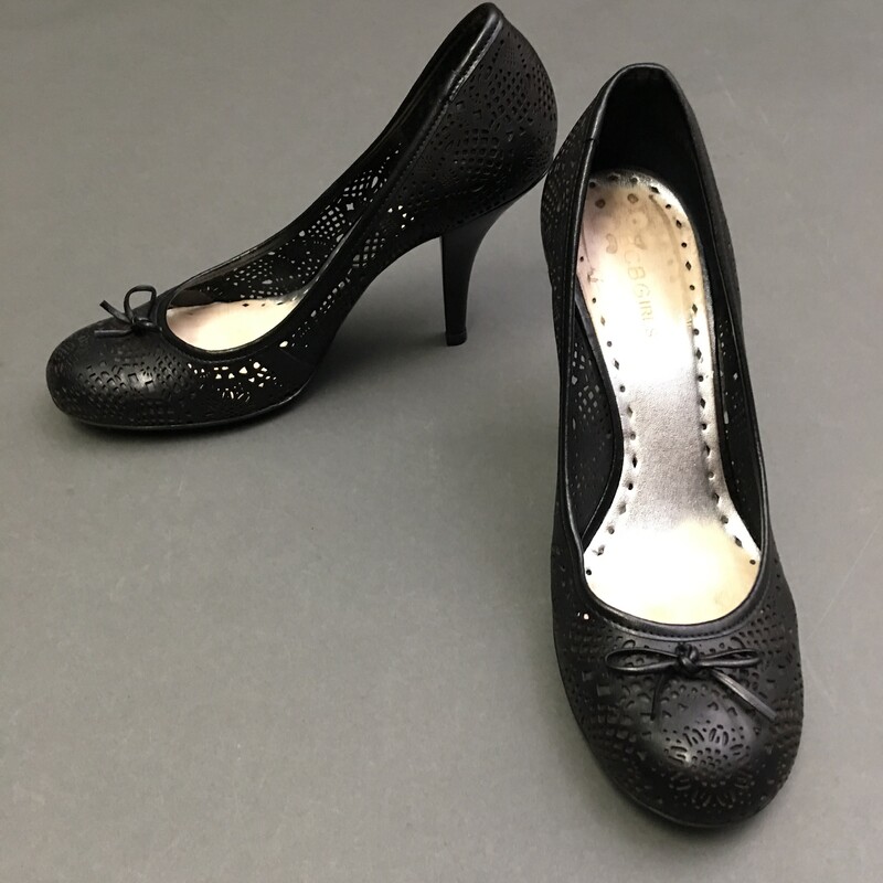 BCBGirls  BG-Dairre, Black, Size: 8.5
Perforated pattern black leather 4\" heels. Shoes show gentle wear interior and sole.
14.3 oz
Has Box