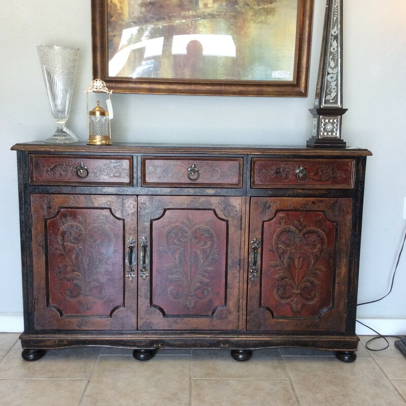This unique Peruvian Entry Cabinet was constructed and hand painted in Peru. It hsa hand wrought hardware and bun feet.