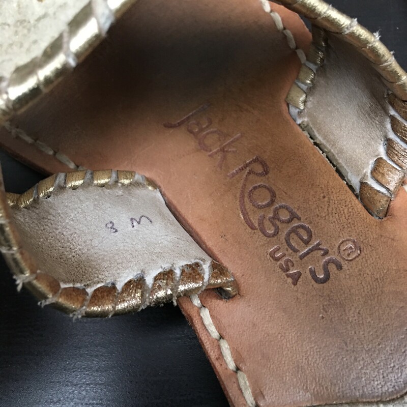 Jack Rogers Leather, Gold, Size: 8<br />
 Made of a soft, supple leather that ages with wear it is no wonder why it's been a classic for almost 60 years. Iconic Details: Our Jacks Flat showcases our signature whip stitch & rondelle, both details that are done by hand on each pair.  Due to this craftsmanship, no pair of Jacks is exactly the same!   Jacks Flat Sandals are made with leather footbeds & stitched to the outsole.  Over time the natural oils of the foot will change the color of the footbed - this is a detail unique to Jacks!<br />
<br />
15MM (1/2\") Stacked Heel<br />
Leather upper<br />
Leather lining<br />
Manmade Sole<br />
<br />
15.7 oz