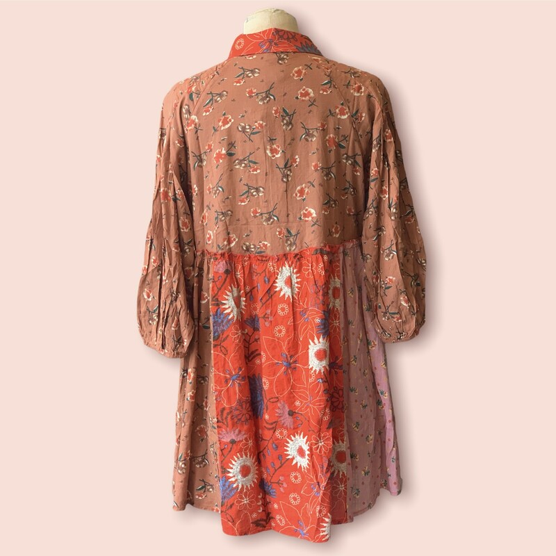 These fabulous dresses have a mix of floral patterns in browns, pinks, and reds! The collar and cinched wrists give this dress a more unique and fashionable look, perfect to throw on and go!