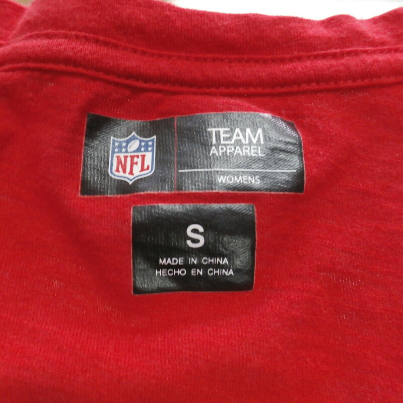 San Francisco 49ers Women's Shirt Size Small Red #17000
Rating:   (see below) 3- Good Condition
Team:  San Francisco 49ers
Player: Team
Brand:  NFL Team Apparel
Size: Women's small  (Measured Flat: across chest 16\", length 23\")
Measured flat: armpit to armpit; top of shoulder to the bottom hem
Color:  red
Style:  short sleeve; v-neck  screen pressed shirt;
Material:    100% cotton
Condition: -3- Good Condition - wrinkled; minor pilling and fuzz;
Item #: 17000
Shipping: FREE