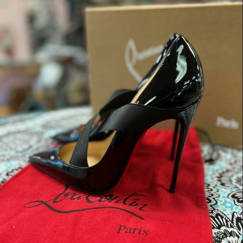 Christian Louboutin Sharpstagram 120 Patent<br />
\"Christian Louboutin's 'Sharpstagram 120' pumps are a sleek addition to any wardrobe. Skillfully crafted in Italy from lustrous patent-leather, this classic point-toe pair has elasticated crisscross straps that comfortably frame and support your foot. Wear them day or night with everything from tailoring to denim.\"<br />
Size: 38 1/2<br />
Comes with box and duster bag<br />
4\" stiletto heel.<br />
Pointed toe.<br />
Crisscross elastic straps.<br />
Leather lining and footbed.<br />
Signature red leather sole.<br />
\"Sharpstagram\" is made in Italy.<br />
Original Retail Price $895.00<br />
This heels are in great condition.  Consignor indicated she wore them once.  She did get clear protectors for the soles, very little toe wear - with some light paint wear(most common wear on red bottom shoes). Upper material is in mint condition.<br />
Australian actress and theatre producer Cate Blanchett was spotted wearing the 'Sharpstagram' in black patent leather at the industry screening of Sony Pictures Classics' \"Truth\".