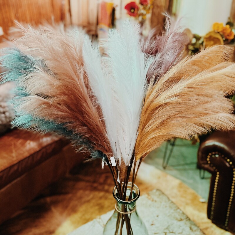 These gorgeous pampas stems are perfect for weddings, parties, or even photography! They come in rich colors of gold, purple, mauve, blue, or white. These elegant colors make these florals a beautiful touch to any decor! Each stem measures 42 inches long.