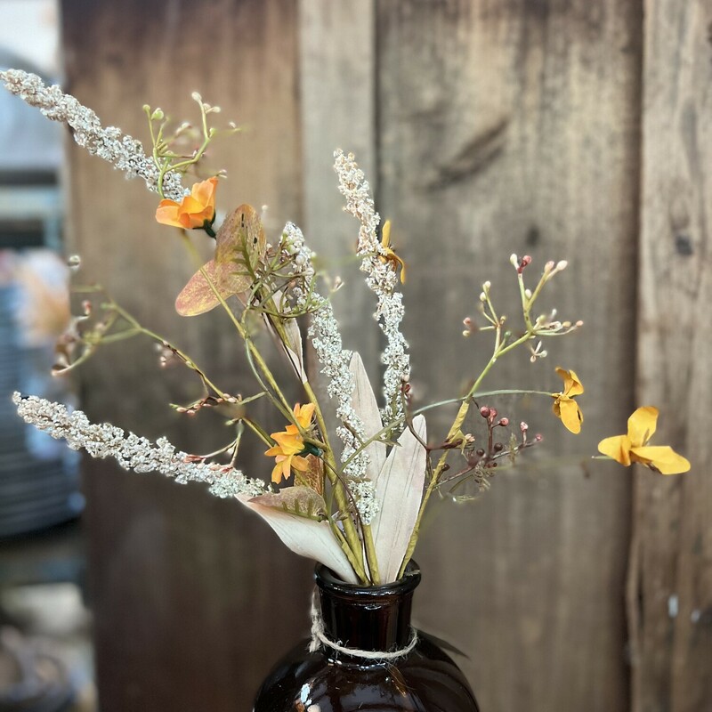 These dainty wild flower stems are perfect for fall but are made of beautiful neutral colors that allow you to use them year round! These stems measure 17 inches in length.