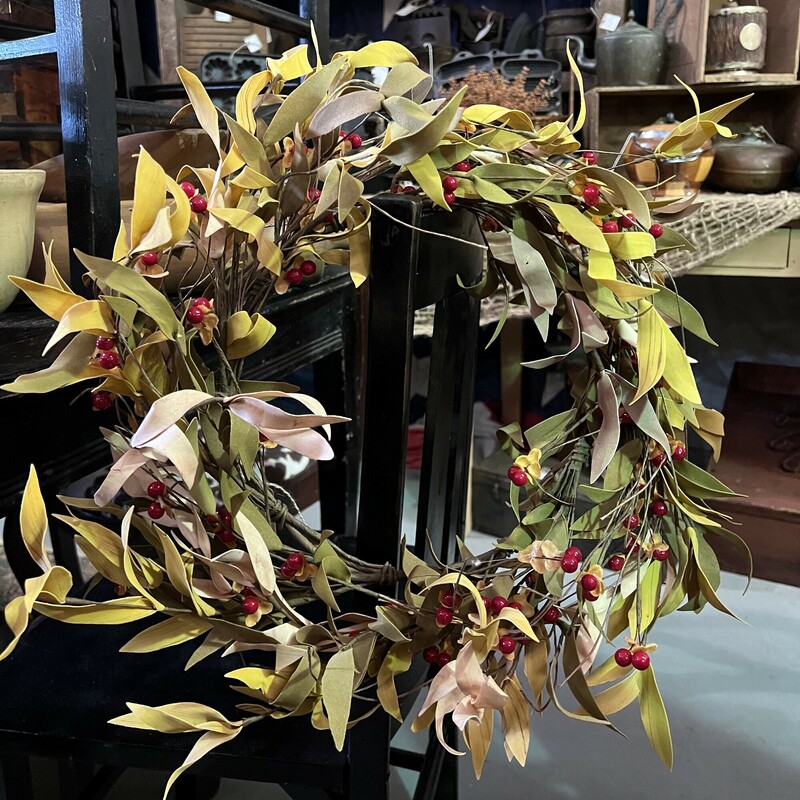This lovely fall wreath is adorned by foam berries and soft fabric leaves in autumnal shades of green and yellow! This wreath will instantly make any door or wallspace look thoughtfully decorated!

Measurements: 10 inch diameter inside, 20 inch diameter outside