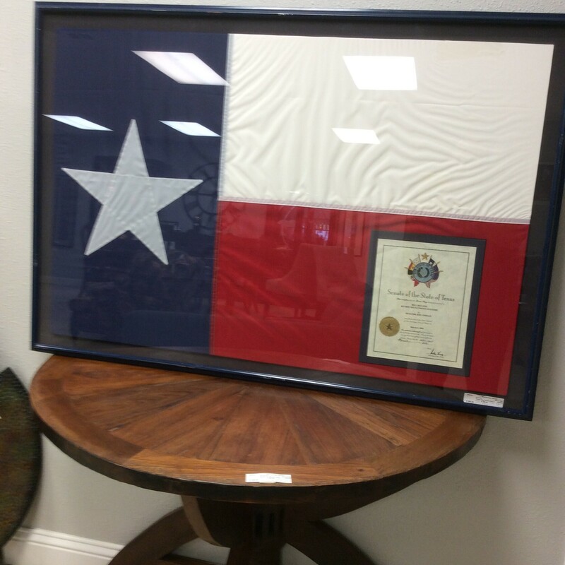 This framed Texas Flag was flown over the Texas Senate Building in Austin. Certificate of authenticity is included.