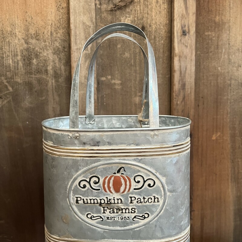 Pumpkin Patch galvanized tote features light distressing and two ring handles. They look great filled with seasonal florals and fabric fillers. Tote measures 11 inches high by 7.25 inches wide and 4.25 inches deep