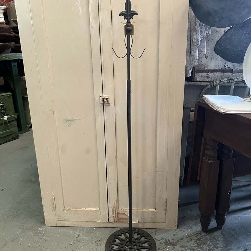 This is our favorite wreath stand. It is made of iron and has hooks on each side so you can add wreaths on both sides.  This stand is also adjustable from 38 inches to 60 inches tall so its perfect for anywhere in your home
Base unscrews for easy storage