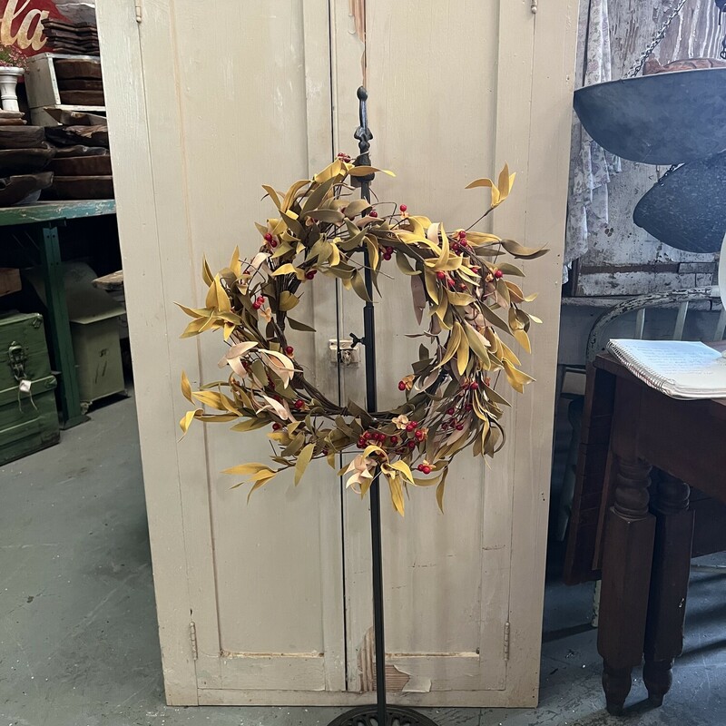 This is our favorite wreath stand. It is made of iron and has hooks on each side so you can add wreaths on both sides.  This stand is also adjustable from 38 inches to 60 inches tall so its perfect for anywhere in your home
Base unscrews for easy storage