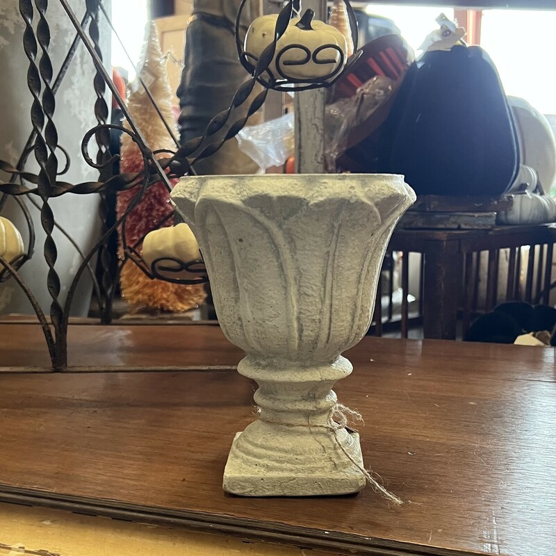 The Cement Urn is another great choice for your home.<br />
This Urn is 8 inches tall and 6 inches wide and its light weight makes it easy for shipping.<br />
Add one of our beautiful half spheres to complete your style