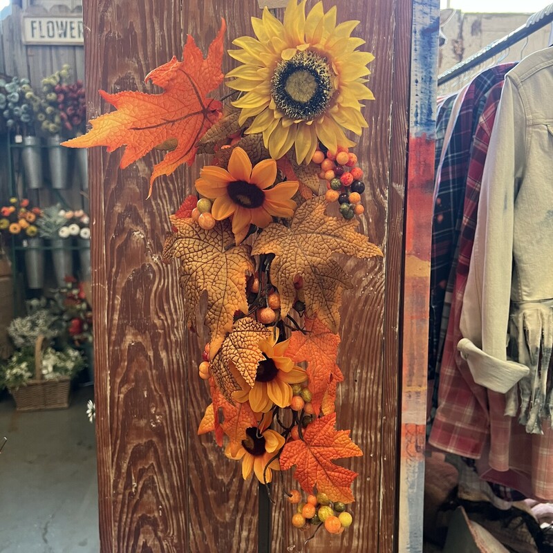Hang this pretty sunflower teardrop anywhere to bring the warmth of the fall season to your home
Teardrop measures 23 inches tall