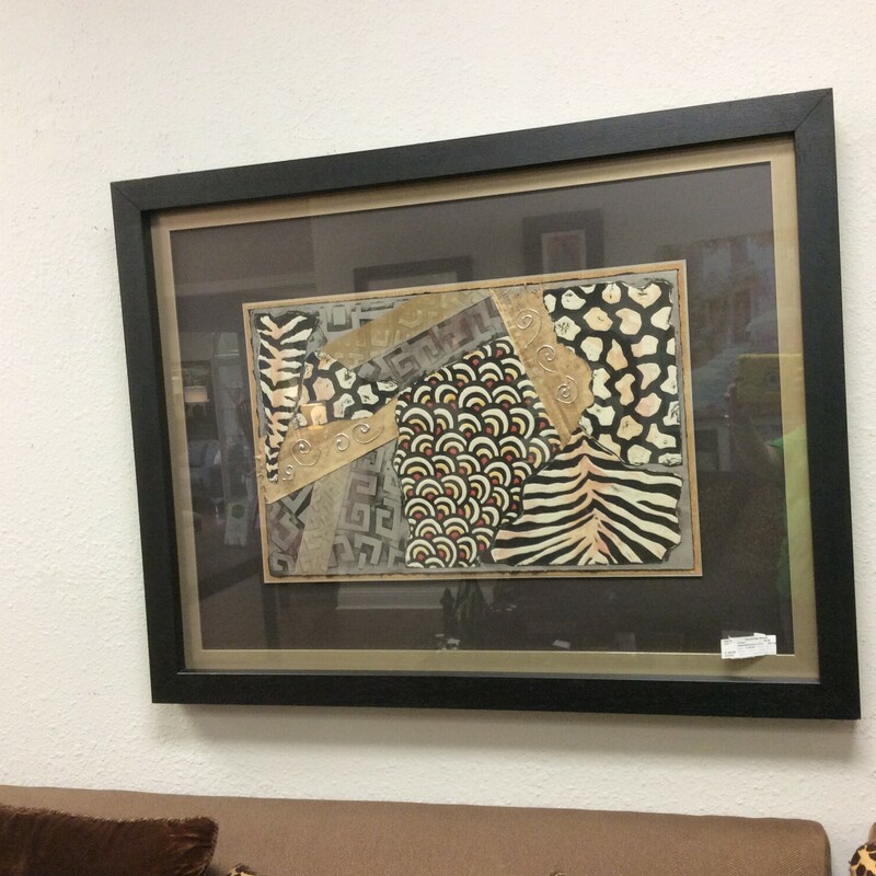 This is a beautiful Animal Kingdom Abstract Print with a matt and black and gold frame.