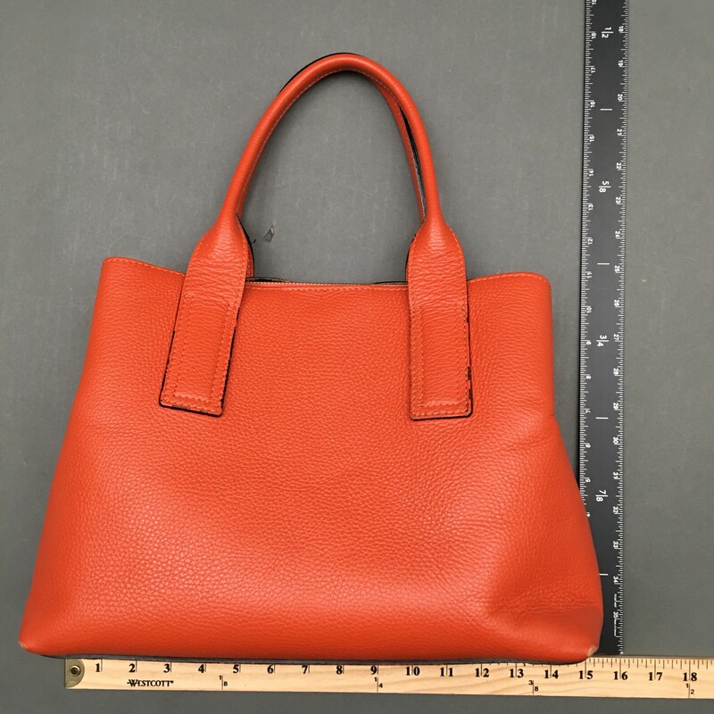Lunana Ferracuti, Orange, Size: M handles and detachable shoulder strap, metal feet on bottom, 2 snaps compartments, 1 center zip compartment, great bag -nice condition - please see all photos, some leather cracking interior and spot where stitching needs repair<br />
2 lbs 1.6 oz