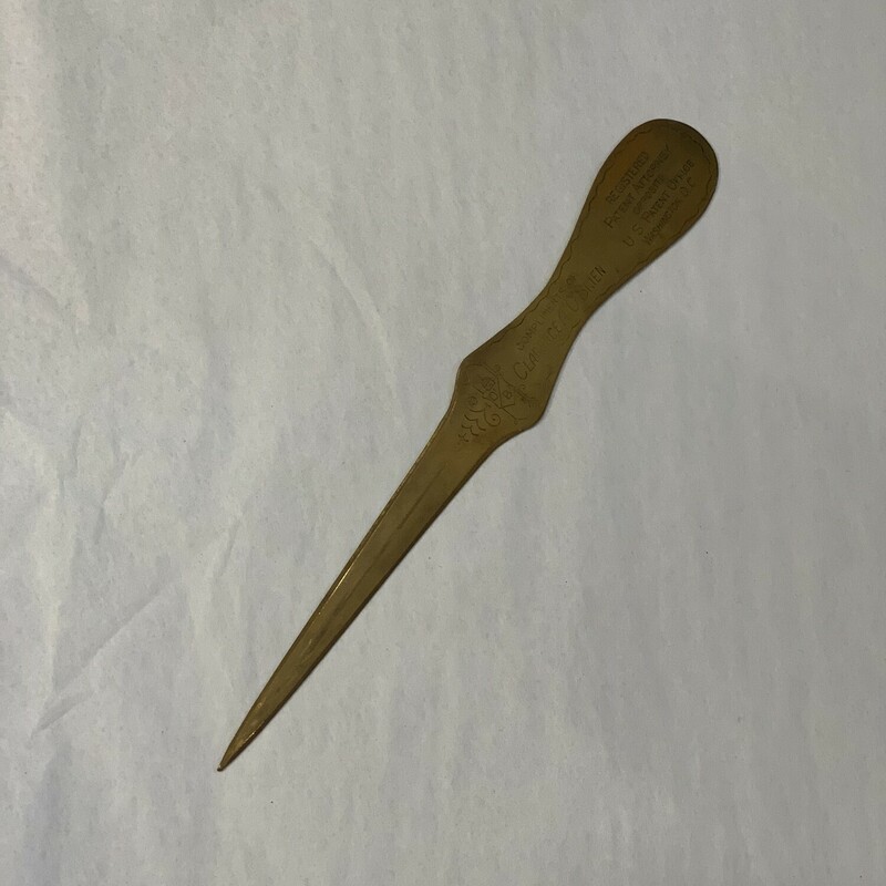 This vintage, brass letter opener measures 8 inches in length