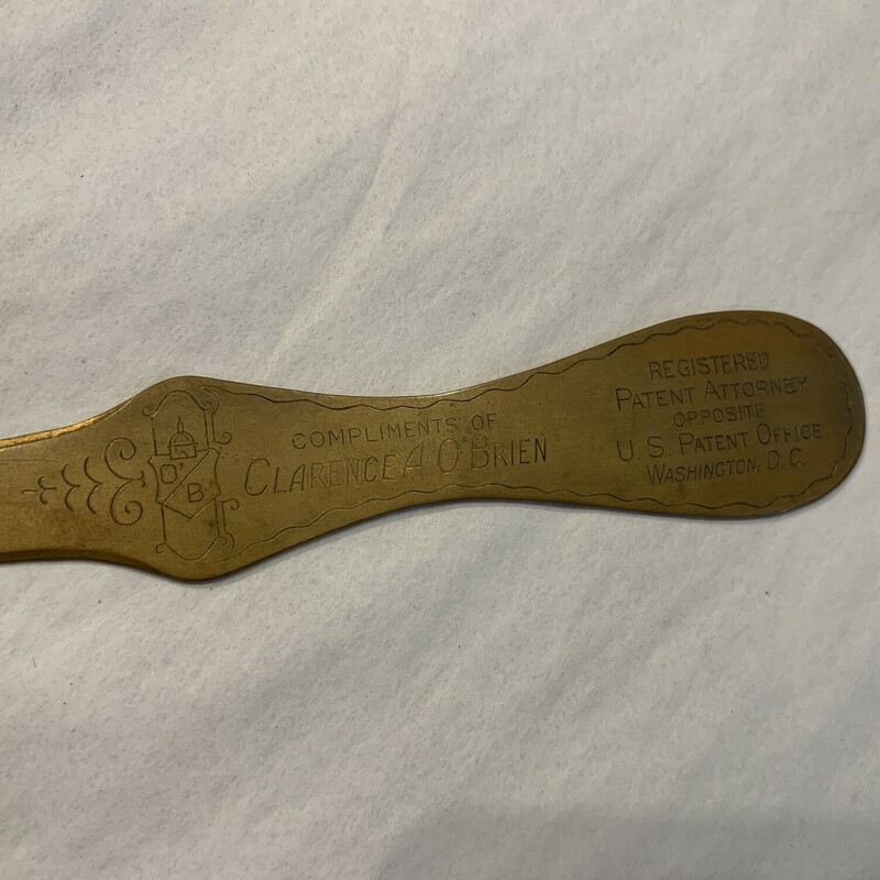 This vintage, brass letter opener measures 8 inches in length