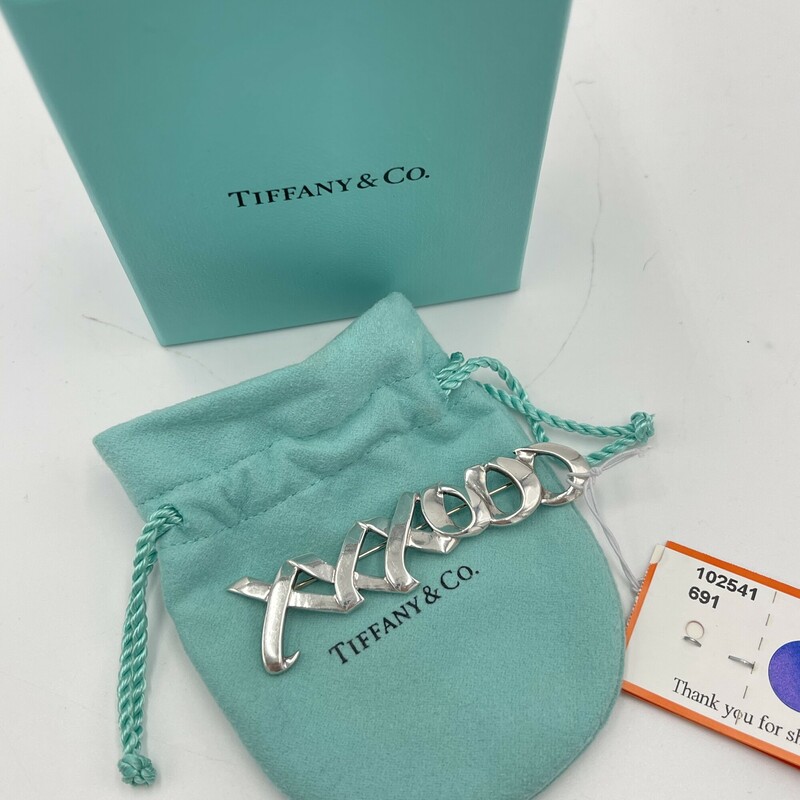 Tiffany & Co. Sterling Silver Paloma Picasso Pin, XXXOOO. Includes box + bag.
Size: 3in
