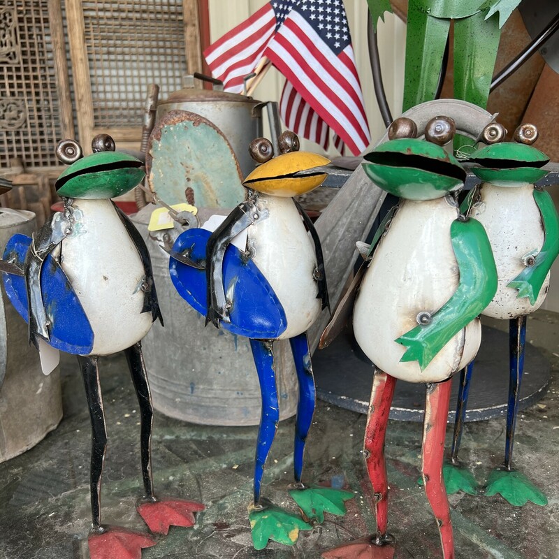 How cute are these surfing frogs?  They are carrying their surfboards and are ready to hit the waves. Add some fun to your outdoor space with these cute guys.
They are all metal and measure 16 inches high and 7 inches wide
Colors vary