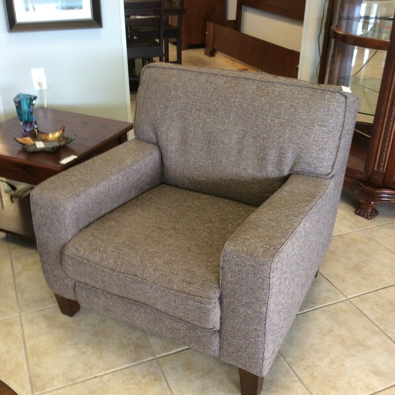 This is a nice, brown linen electric recliner.