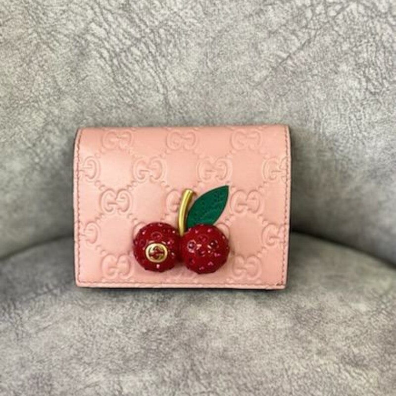 GUCCI
Guccissima Cherries Card Case Wallet
This is an authentic GUCCI Guccissima Cherries Card Case Wallet in Pink. This petite, yet stylish case is crafted of Guccissima white leather. The case features a large red acrylic double cherrie closure lined in ruby crystals. This wallet opens to a compact Pink leather interior with six card slots, two patch pockets, and a built in bill flap. This is a beautiful card holder with a fun twist of style from Gucci!
Designer ID: 476050 1147
Base length: 4.25 in
Height: 3.50 in
Width: 1.00 in
This wallet is in Beautiful Condition.
COMES with CERTIFICATE of AUTHENTICITY
This selling on Poshmark for $625.00 currently, TRADESY has it for sale at $740.00