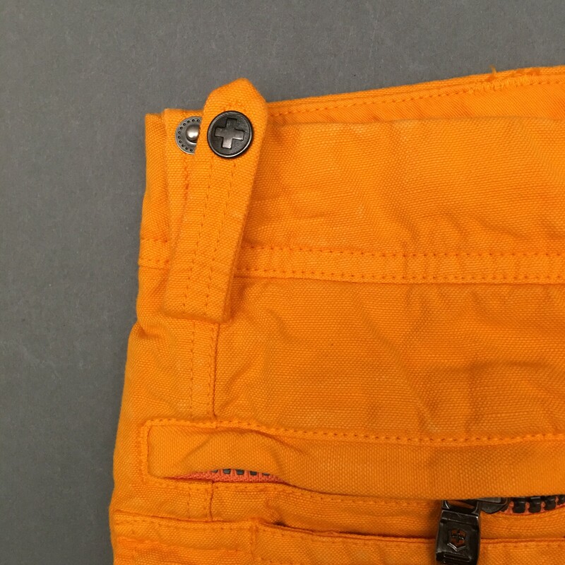 Victorinox Isle Swiss , Orange, Size: 14<br />
Victorinox Isle Swiss Army bright orange shorts. 60% cotton, 40% linen. 2 front flat zip pockets, 2 front snap pockets m button and zip closure, wide waist band, utility snap belt loop, 2 flap snap closure back pockets, New With Tags<br />
12.9 oz