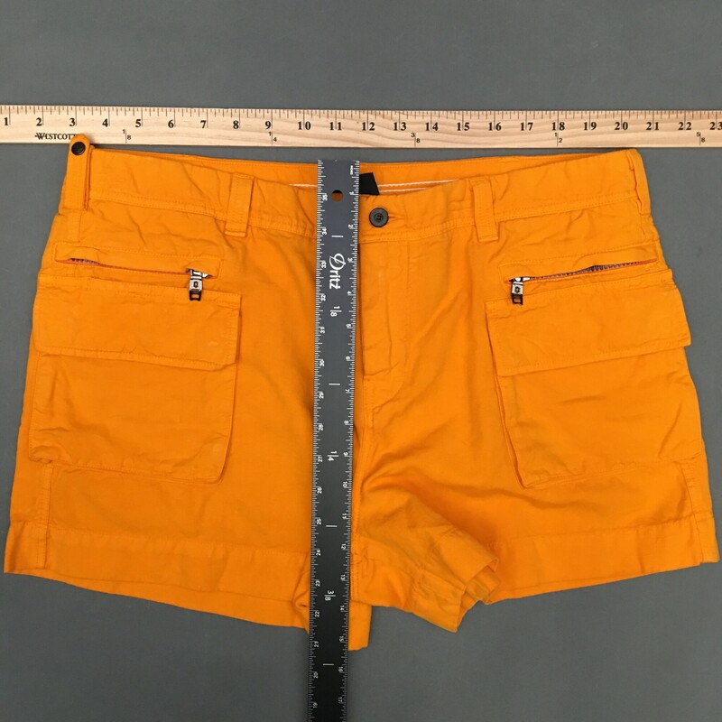 Victorinox Isle Swiss , Orange, Size: 14<br />
Victorinox Isle Swiss Army bright orange shorts. 60% cotton, 40% linen. 2 front flat zip pockets, 2 front snap pockets m button and zip closure, wide waist band, utility snap belt loop, 2 flap snap closure back pockets, New With Tags<br />
12.9 oz