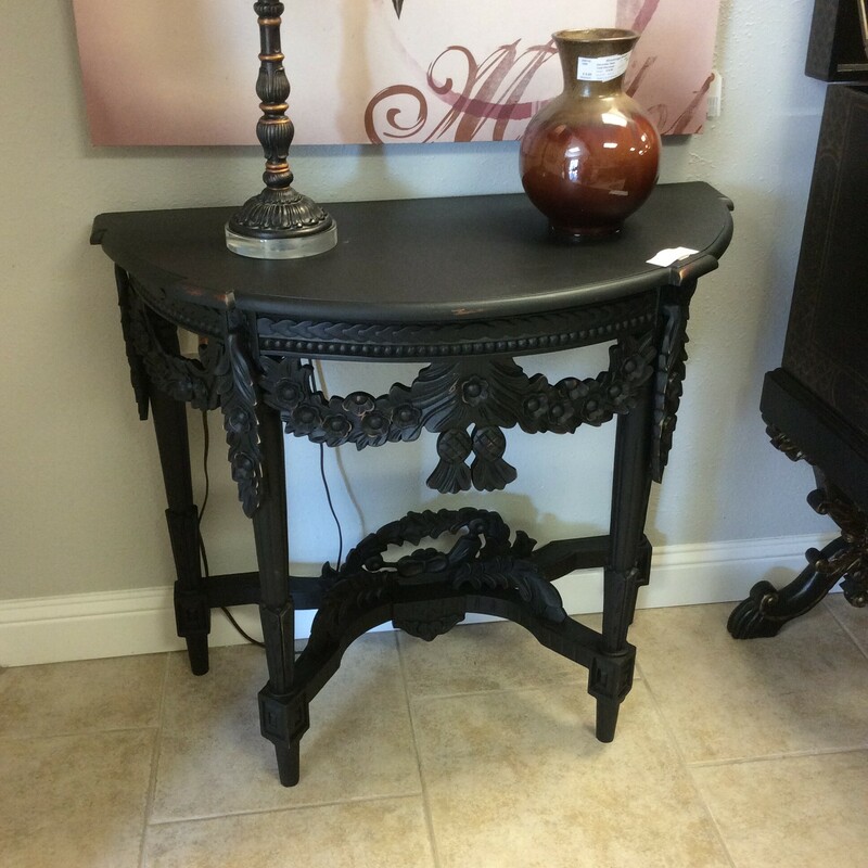 This is a beautiful, hand painted, black Half Moon Table.