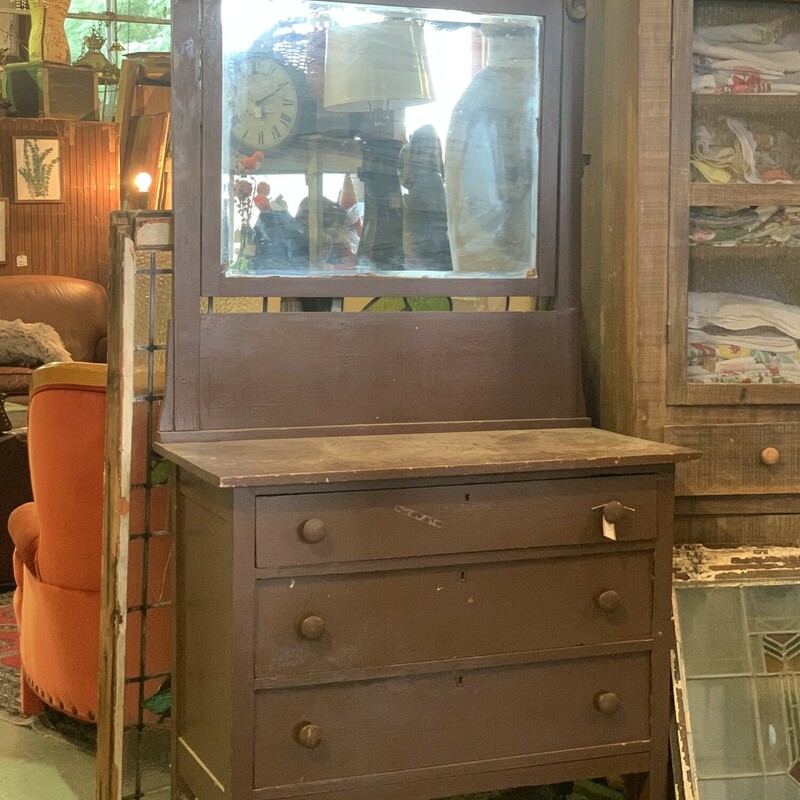 This vintage brown dresser with a mirror attatched is gorgeous! With a neutral brown painted color, this piece matches any home easily!

Measurements:
Width: 38 Inches
Depth: 18 Inches
Height to Top of Dresser: 33.5 Inches
Height to Top of Mirror: 77 Inches
