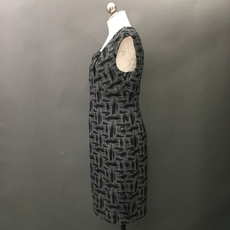 Calvin Klein Poly Knit, Pattern, Size: 8<br />
Calvin Klein polyester blend knit Empire dress black brush strokes on dark grey, cap sleeves, 2 buttons detail on front, square neckline, zip back,<br />
15.3 oz